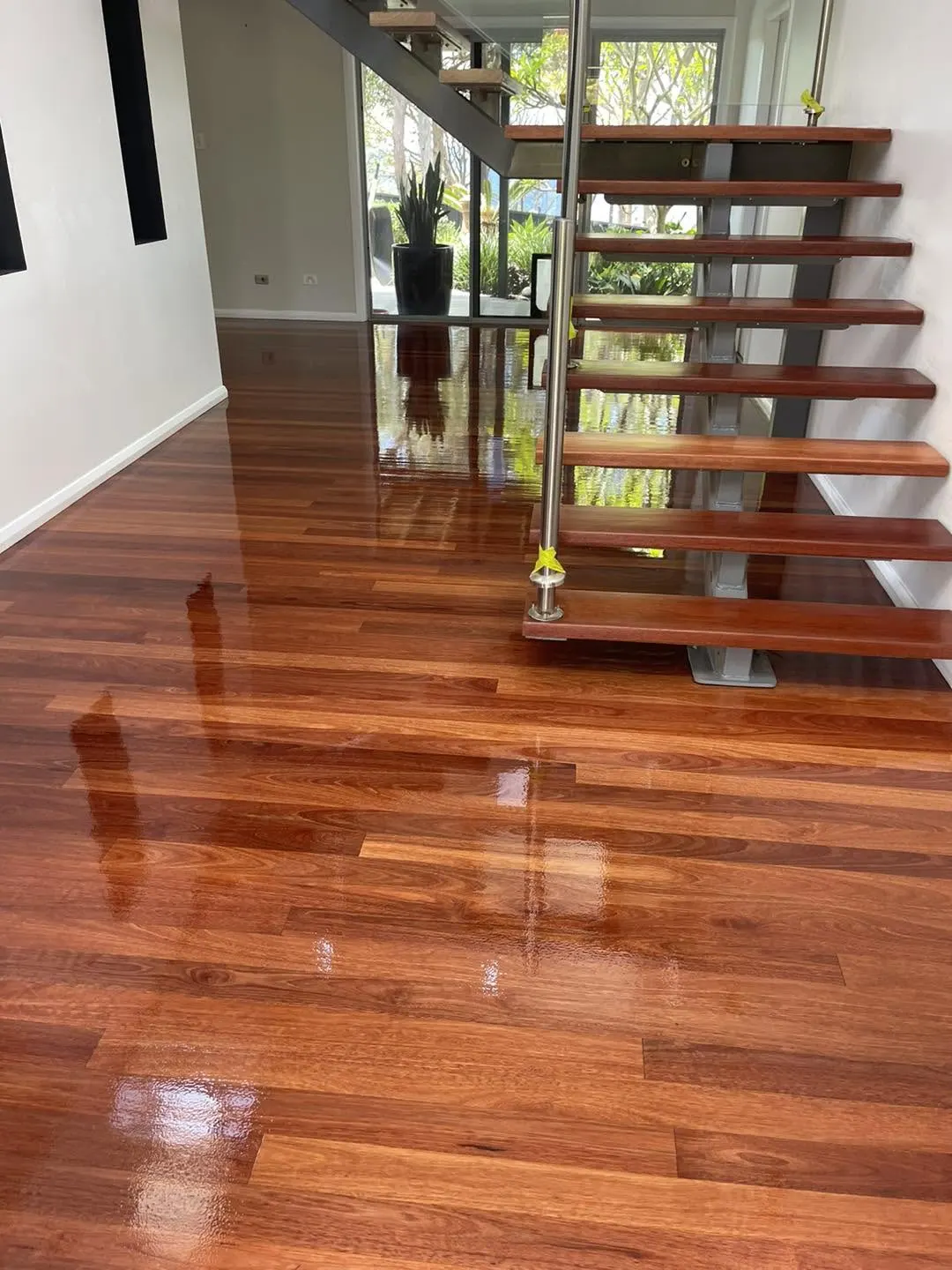 Sanded and polished timber floor by A & T’s