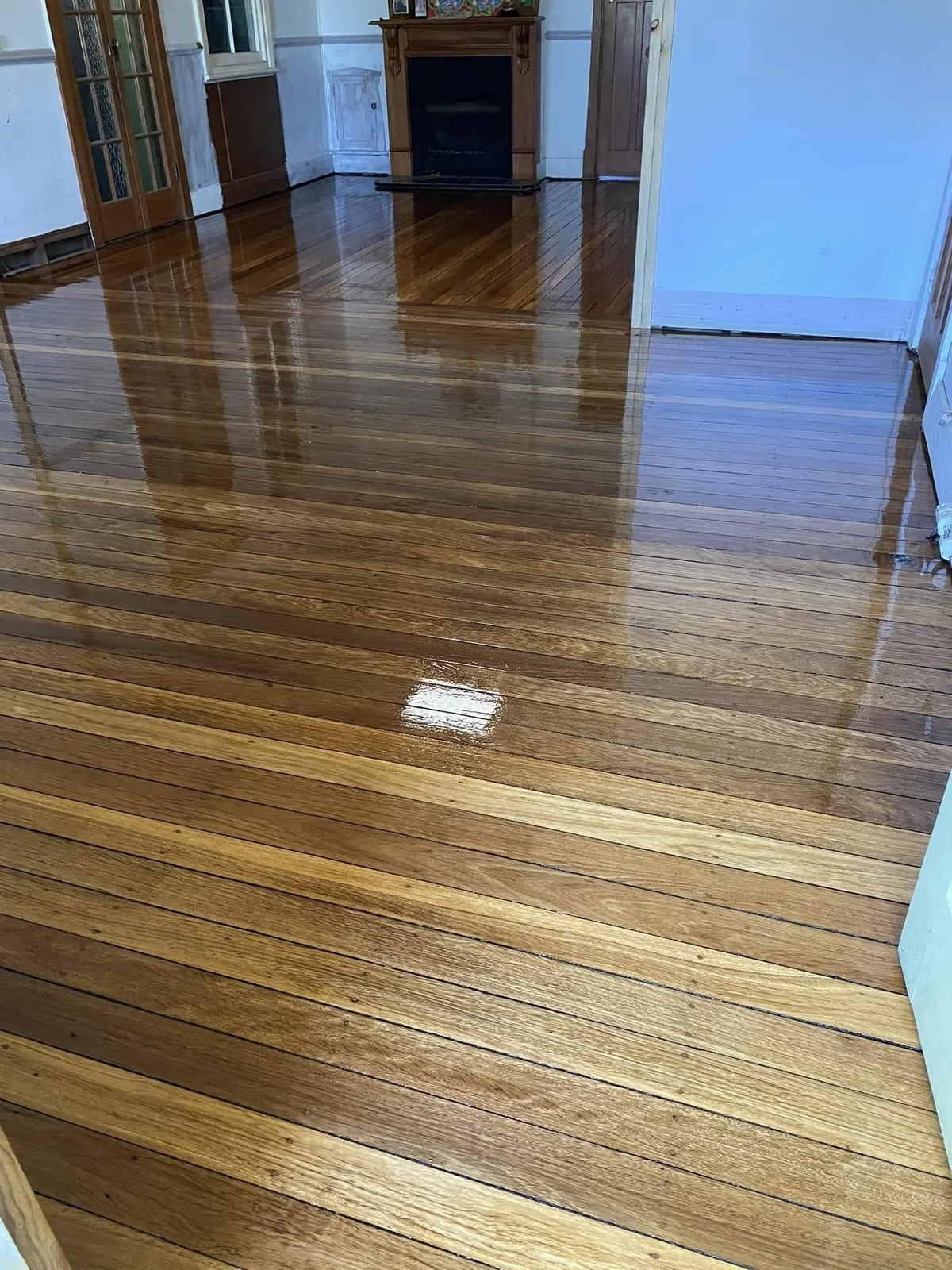 Sanded and polished timber floor by A & T’s